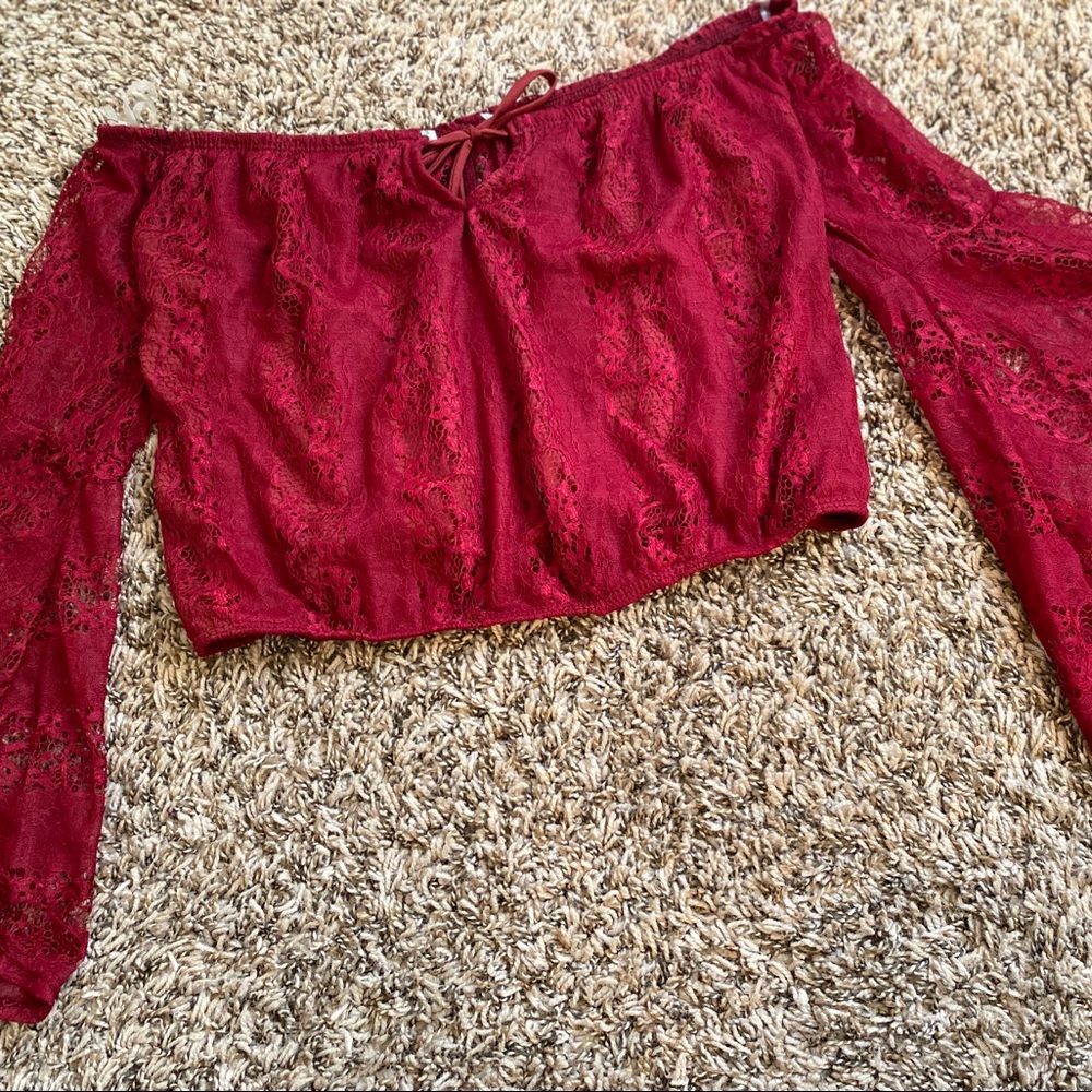 maroon crop top with long bell sleeves